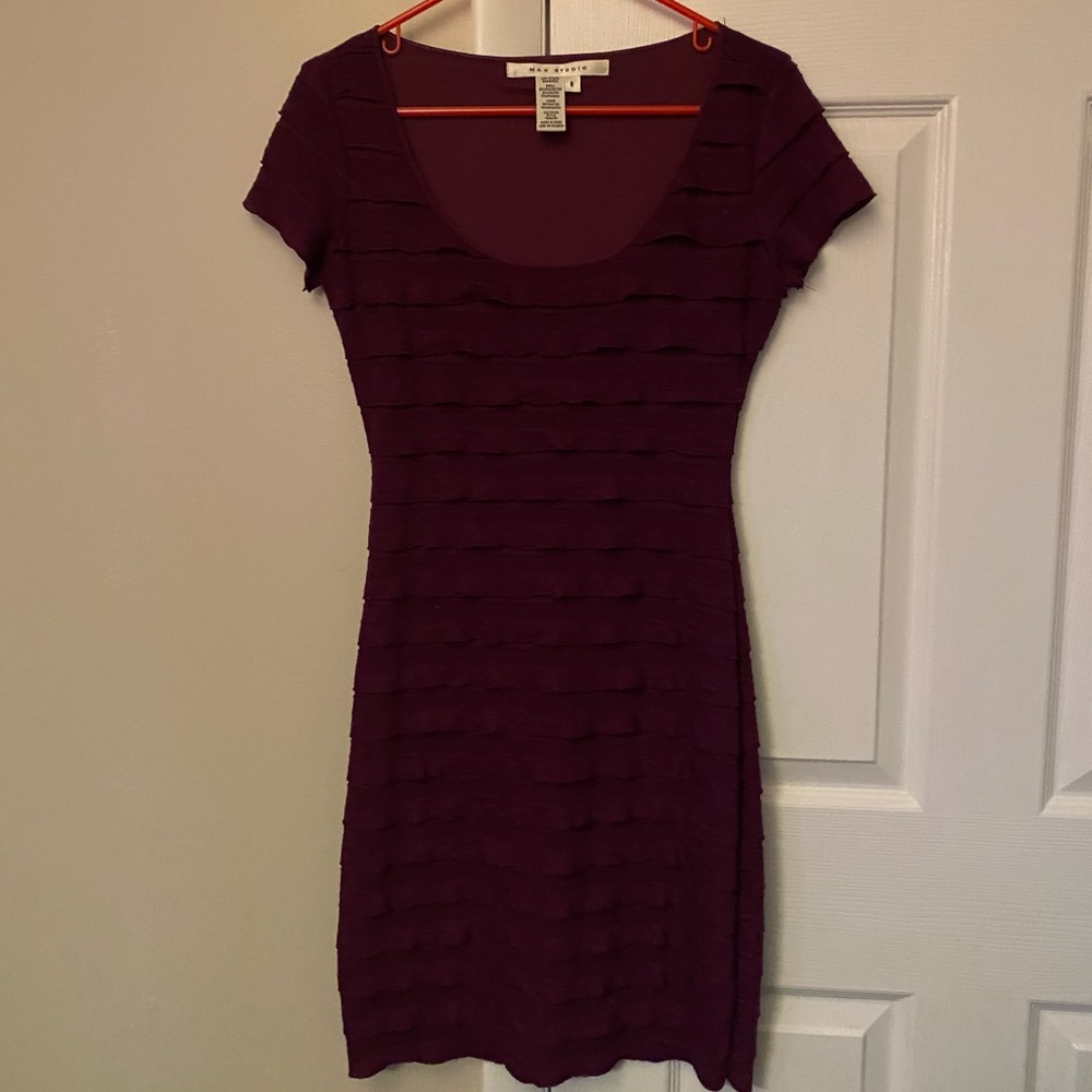 Purple form fitting cocktail dress with ruffles